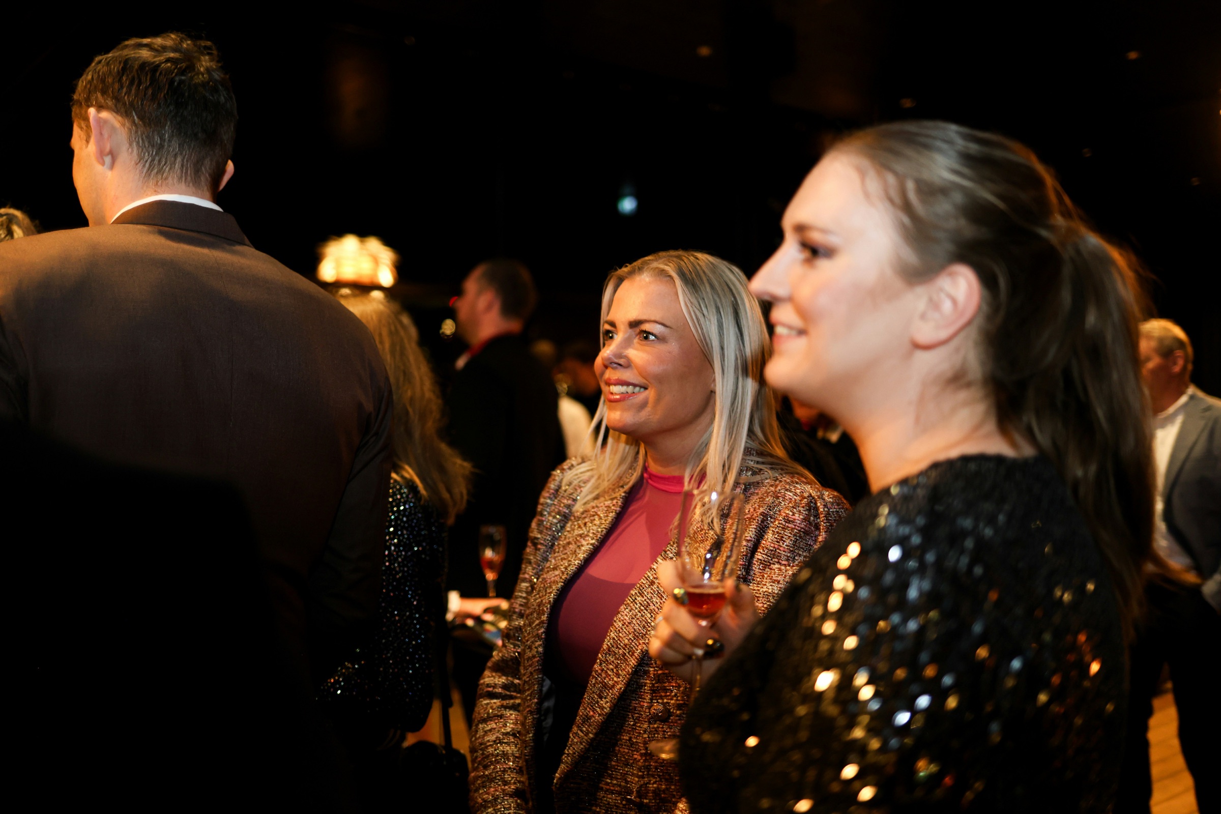 Guests talking over drinks at an upscale Just Singles Dubai evening